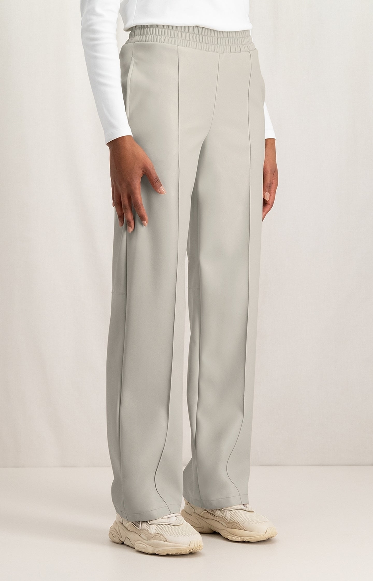 Faux leather wide leg trousers with elastic waist and pocket