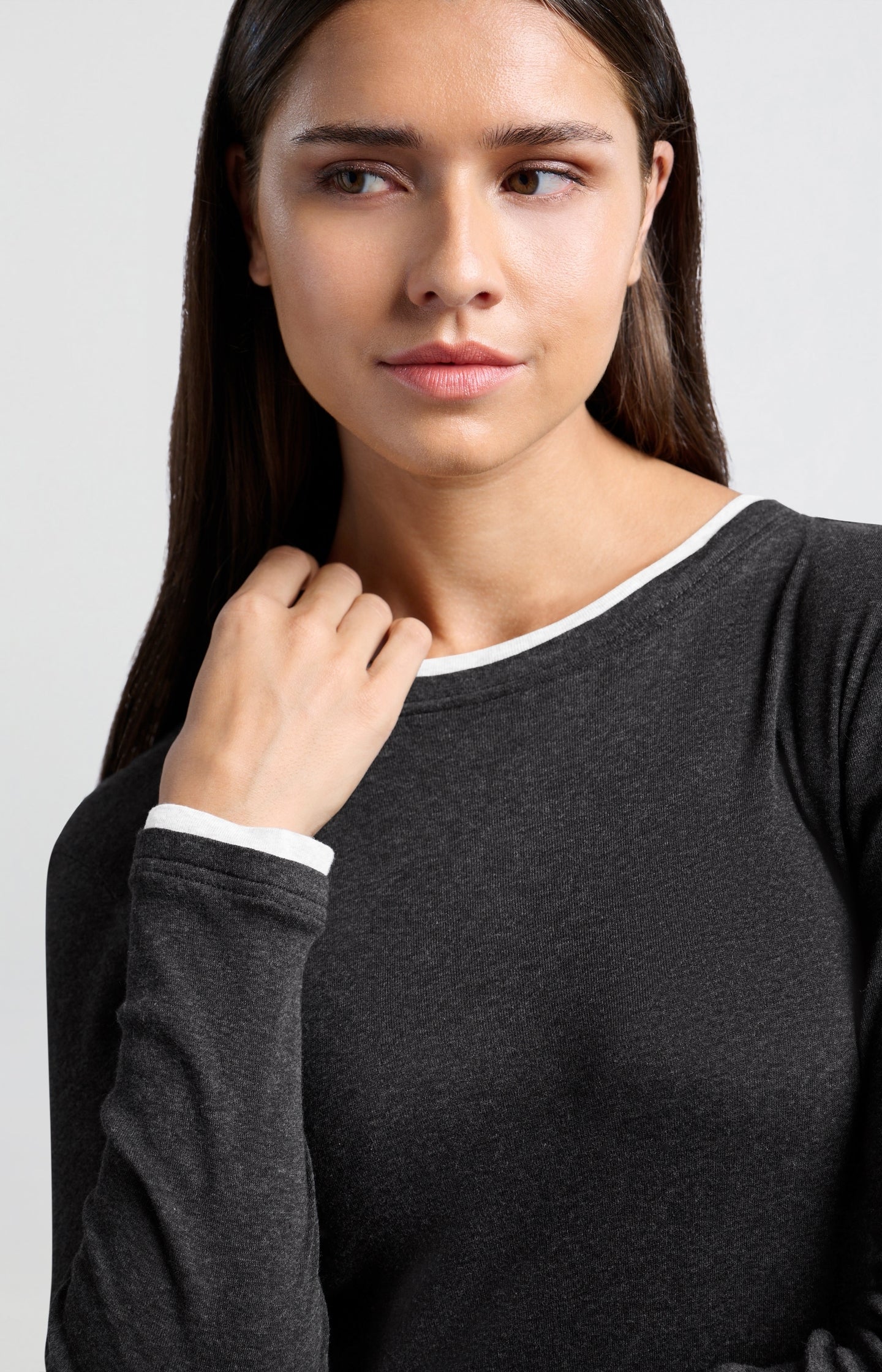 Dark gray top with long sleeves and round neck