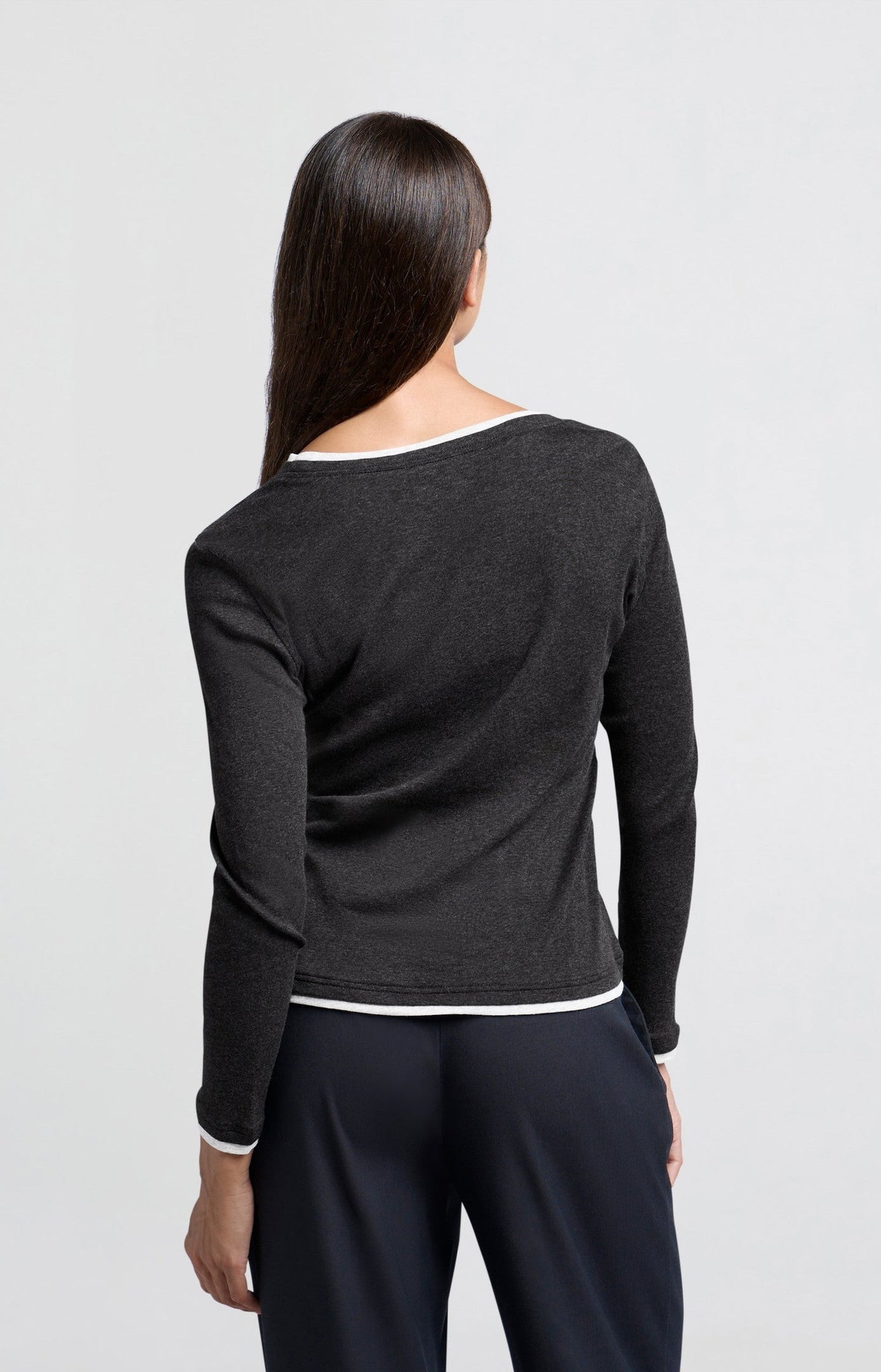 Dark gray top with long sleeves and round neck