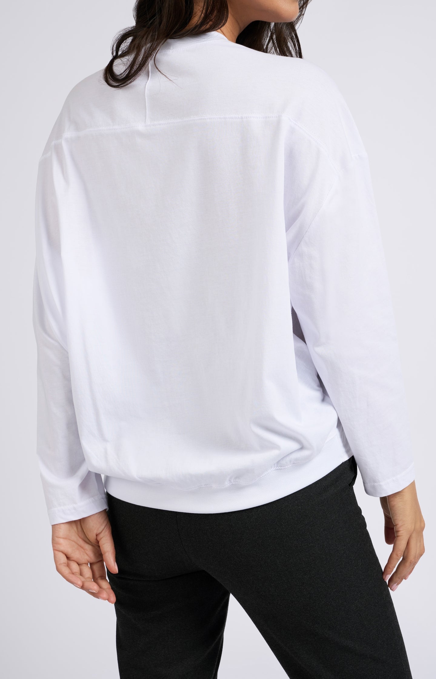 White long-sleeve top with round neck in mixed materials